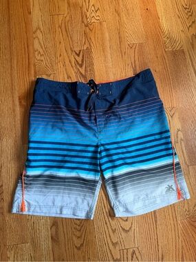 Xersion Men’s Navy and Bright Blue Gradient Stripe Board Shorts with Orange Trim